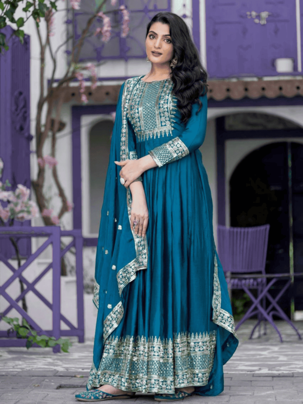 designer party wear gown crafted from heavy Chinon silk, featuring 5mm embroidery sequence work and full sleeves, paired with an embroidered dupatta.