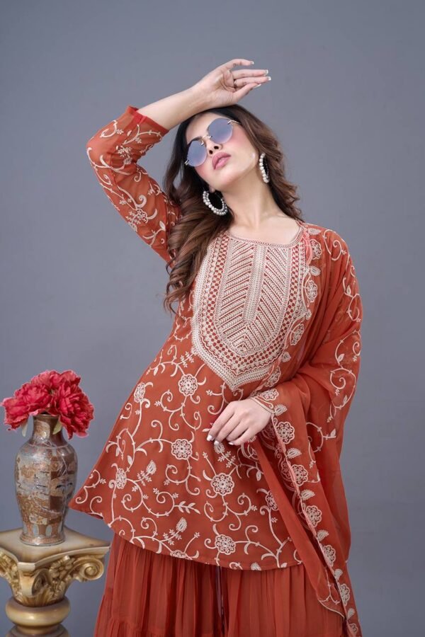 Heavy georgette sharara set with embroidery, ruffle flair, full-sleeve top, and embroidered dupatta.