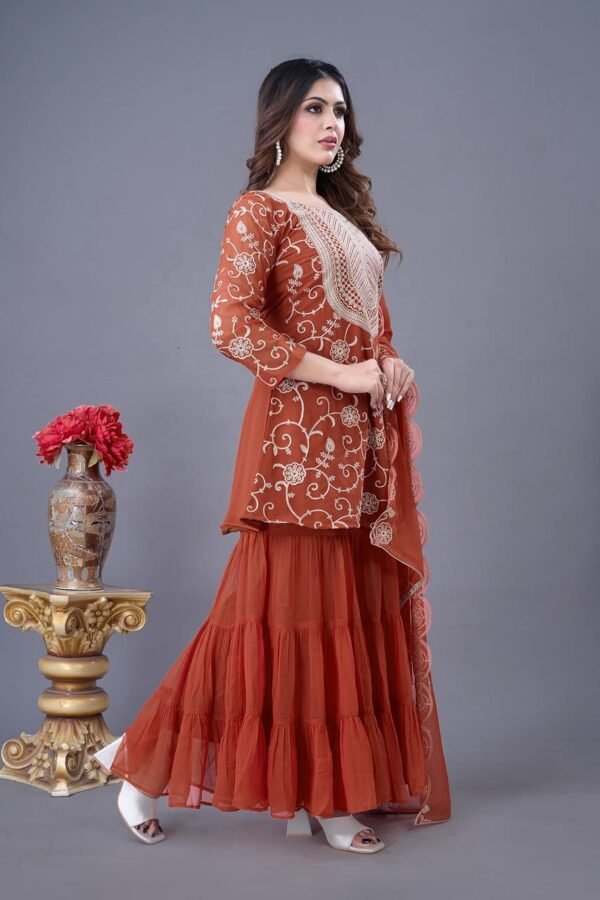 Heavy georgette sharara set with embroidery, ruffle flair, full-sleeve top, and embroidered dupatta.